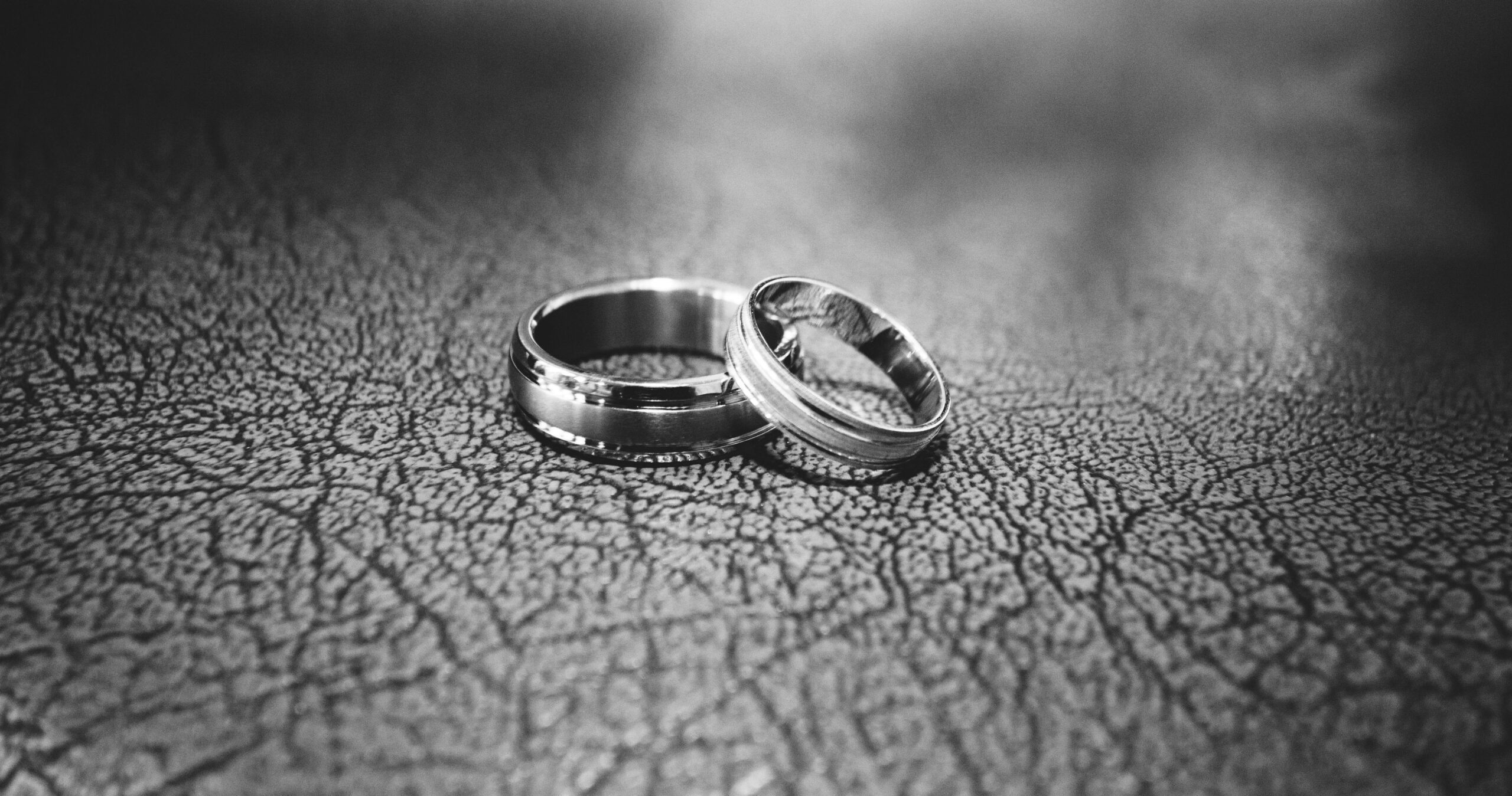 Close-up of Wedding Rings on Floor